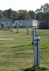 Numerous stand pipes for individual caravan plots which are unused for 6 months each year, allowing the water to stagnate.