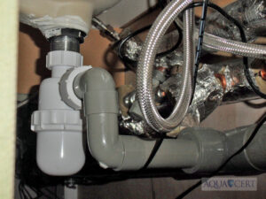 Flexible hoses connecting wash hand basin taps to water supply